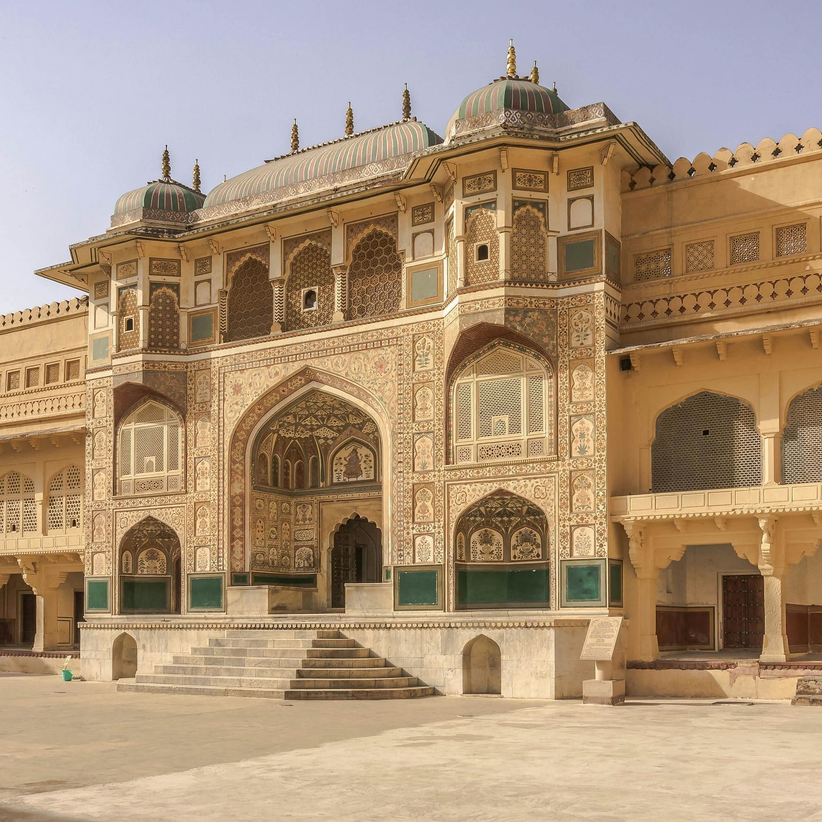 Amber Fort facade against the clear sky, showcasing its stunning architecture.
